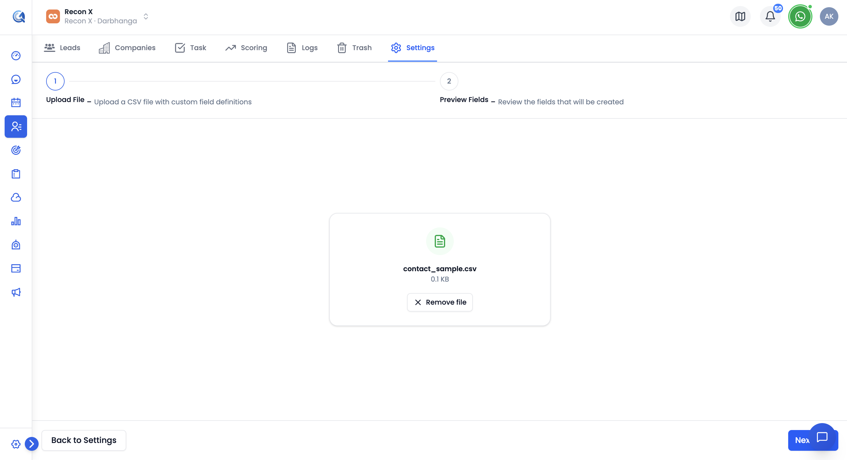 Custom field import wizard showing the file upload step with a Download Sample link